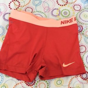 spandex orange nike shorts